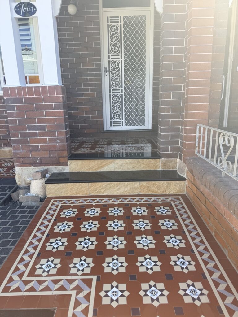 Coogee tiled entrance with NightBridge pattern and Balmain border below the front steps